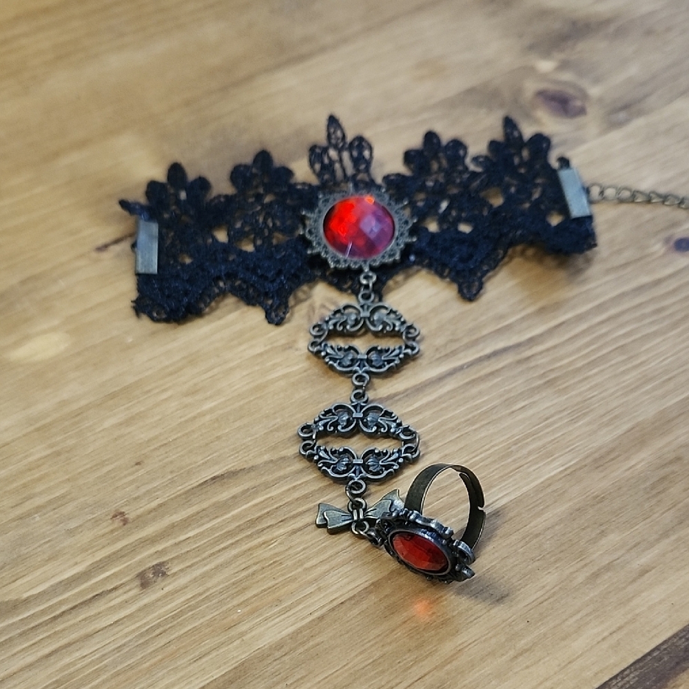 Elegant Black Lace Bracelet with Red Gemstone